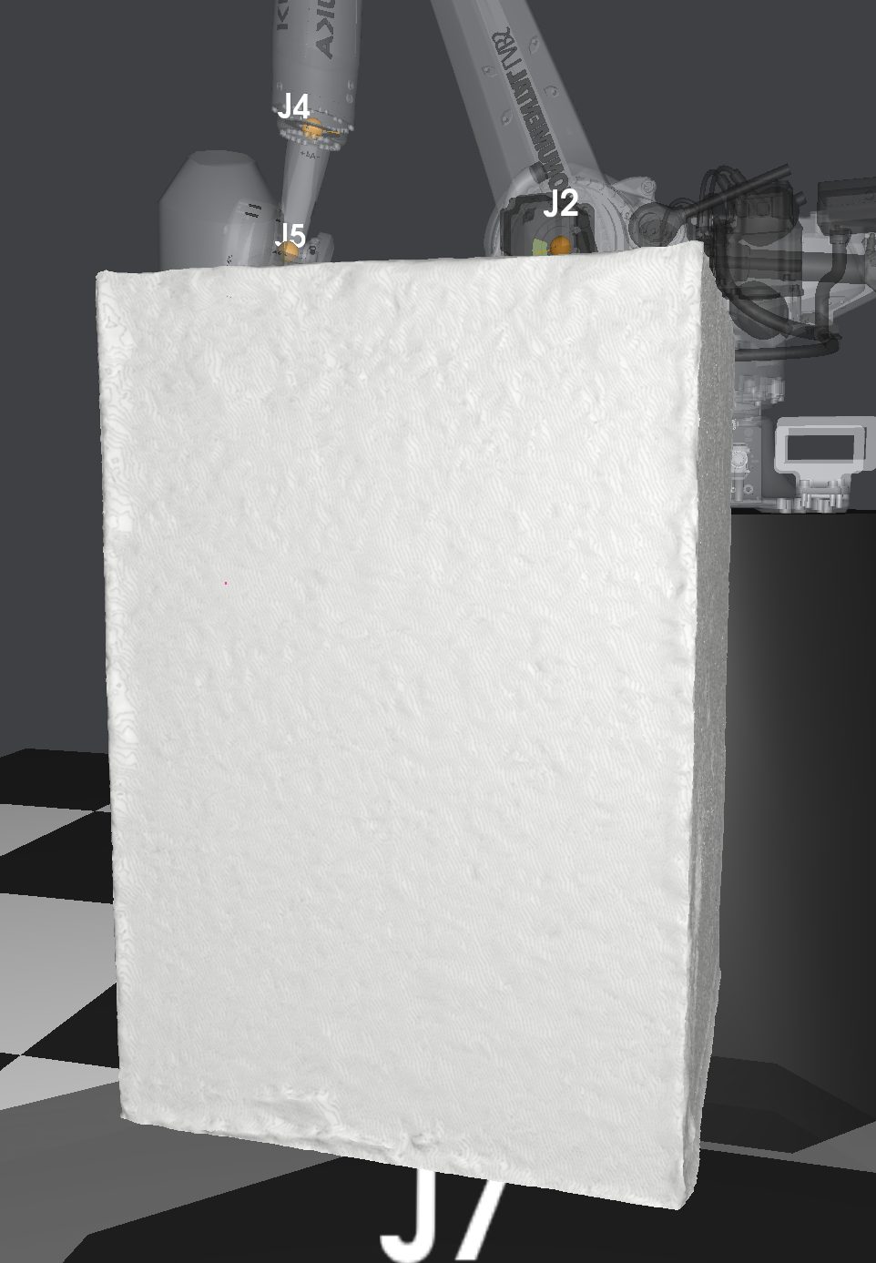 Simulated rough marble block in front of a robot arm.